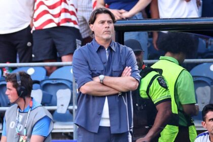 USA coach Mauricio Pochettino kicks Powerade bottles in frustration as team’s first half defense looks shaky