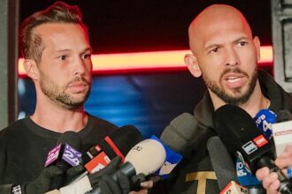 Tate brothers to remain behind bars for now as UK seeks extradition on rape, trafficking charges