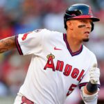 Angels third baseman brings basketball onto the diamond, turns slick double play with unconventional move