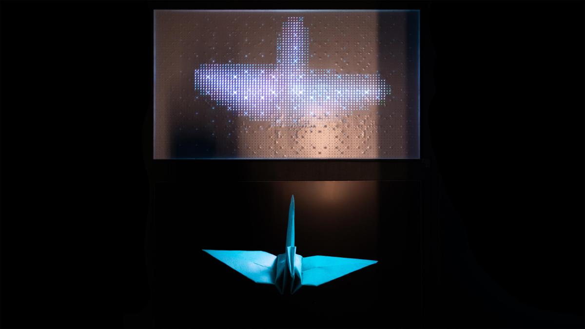 Two TVs, one of which just showing its LED backlight.