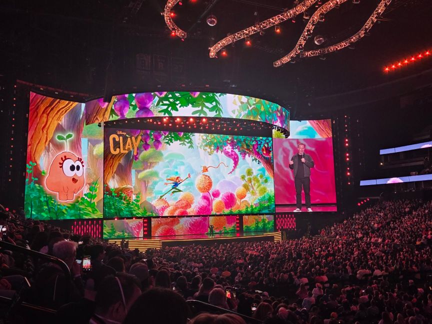 Someone on stage introducing the new Disney animation called Clay