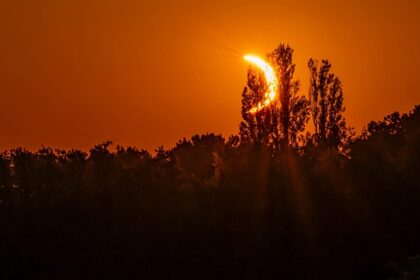 Video. Hikers in awe as solar eclipse turns sky red over French Pyrenees