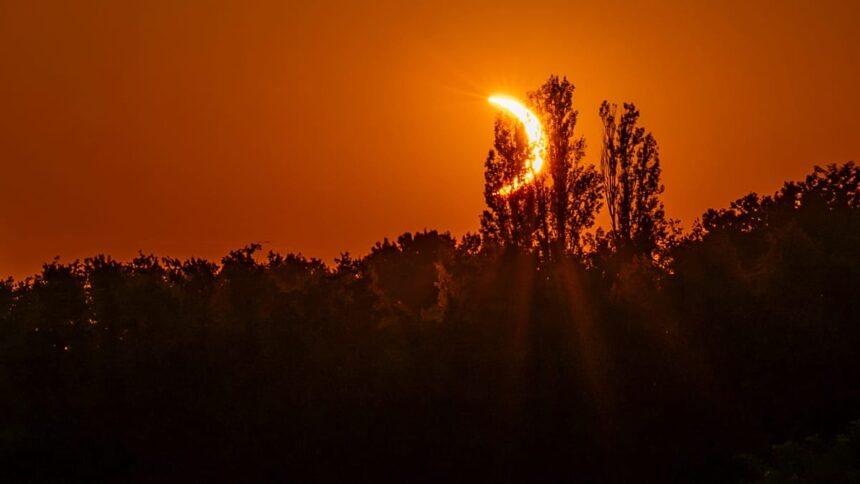 Video. Hikers in awe as solar eclipse turns sky red over French Pyrenees