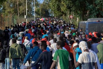 Spanish authorities relocate migrants in Ceuta to temporary shelters