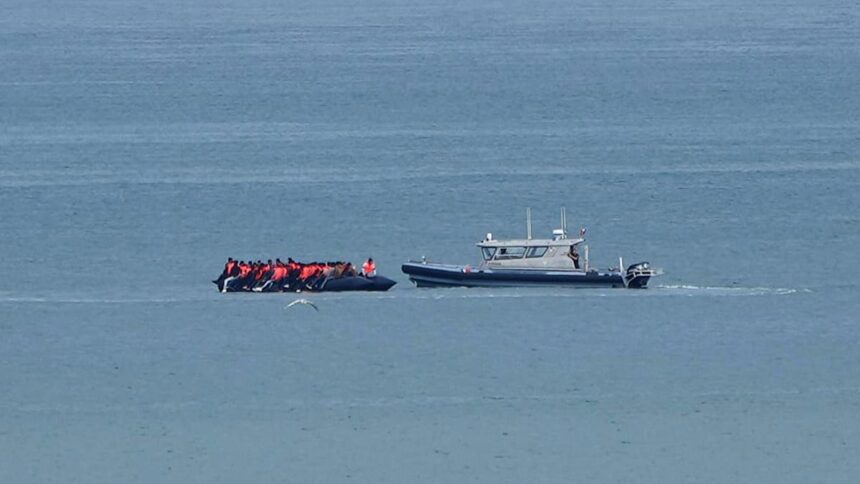 Record 230 migrants cross English Channel in single small boat
