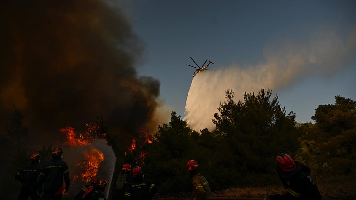 People evacuated from beach as wildfire tears through north Greece