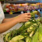 Should you shuck corn before buying it? Expert weighs in on controversial grocery store move