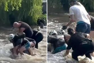 Woman miraculously survives being sucked through flood tunnel as rescuers become victims themselves trying to pull her out