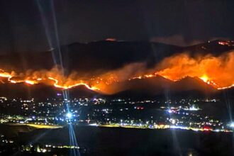 Nevada brush fire spreads to 10,500 acres as governor declares state of emergency