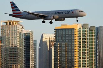 American Airlines flight lands safely after laptop battery catches fire on board; passenger injured