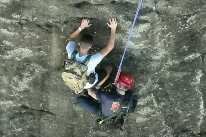 Free climber stranded on Georgia rock face calls 911, prompting dramatic rescue by firefighter
