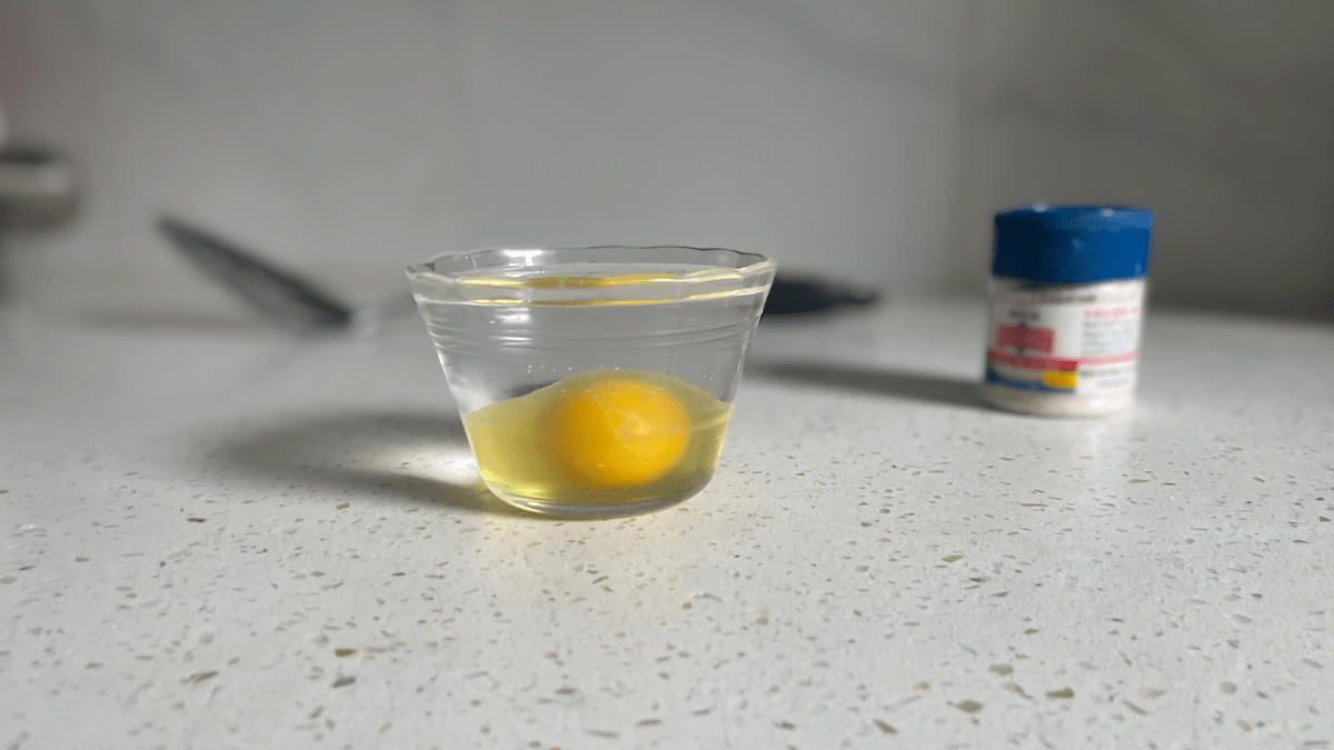 egg in water in ramekin
