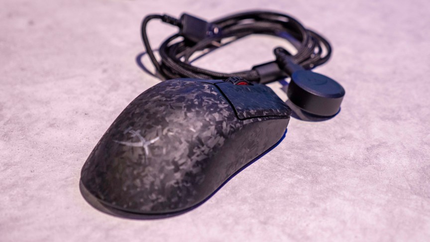 The Pulsefire Haste 3 Pro mouse sits flat against a white surface.