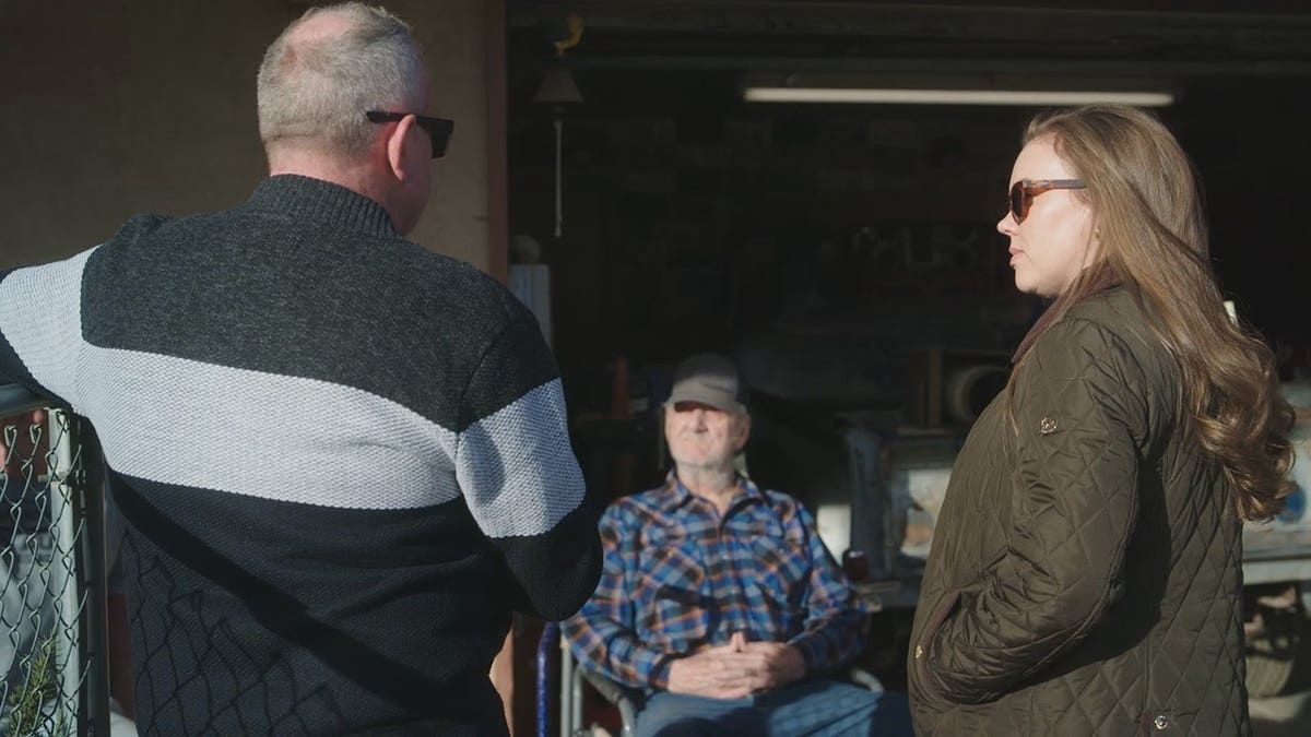 Kara Robinson Chamberlain speaking with loved ones during the filming of