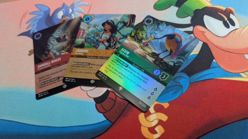 Three foil cards from the latest Lorcana set, Attack of the Vine