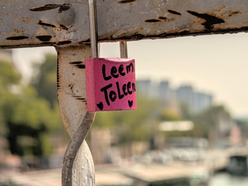 Image of a padlock with writing on it