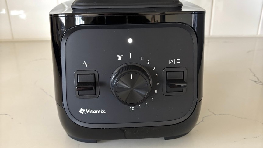 A close-up on the Vitamix VX1 blender's dials and switches.