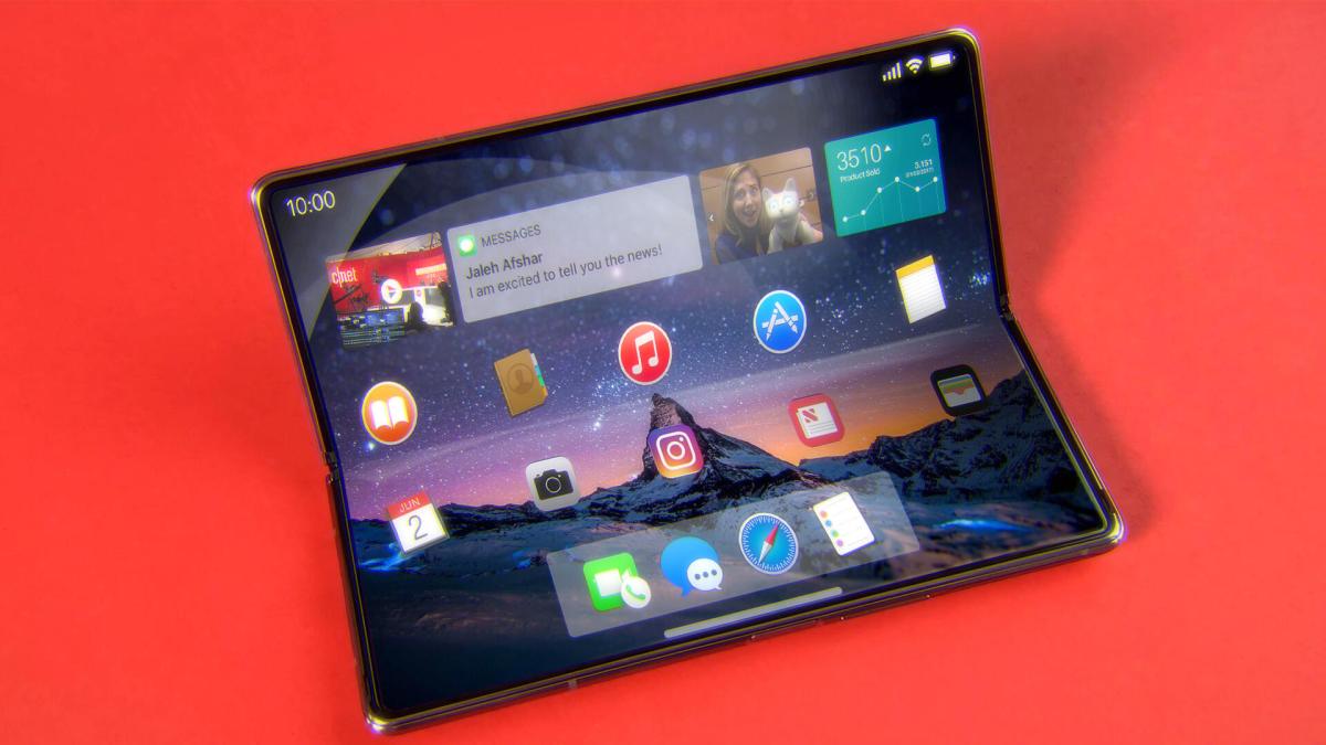 A mock-up of a foldable iPhone on a red background