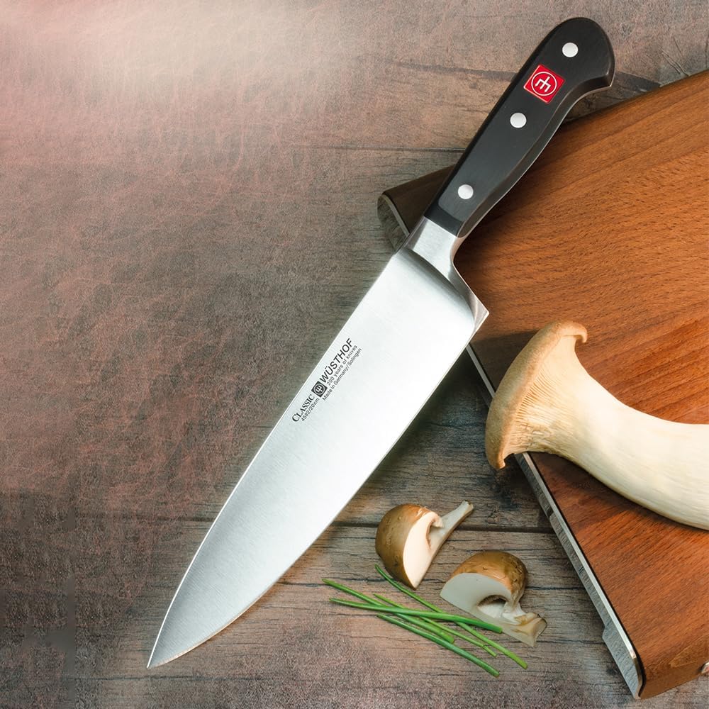 WÜSTHOF Classic 8 Inch Chef’s Knife on a brown cutting board