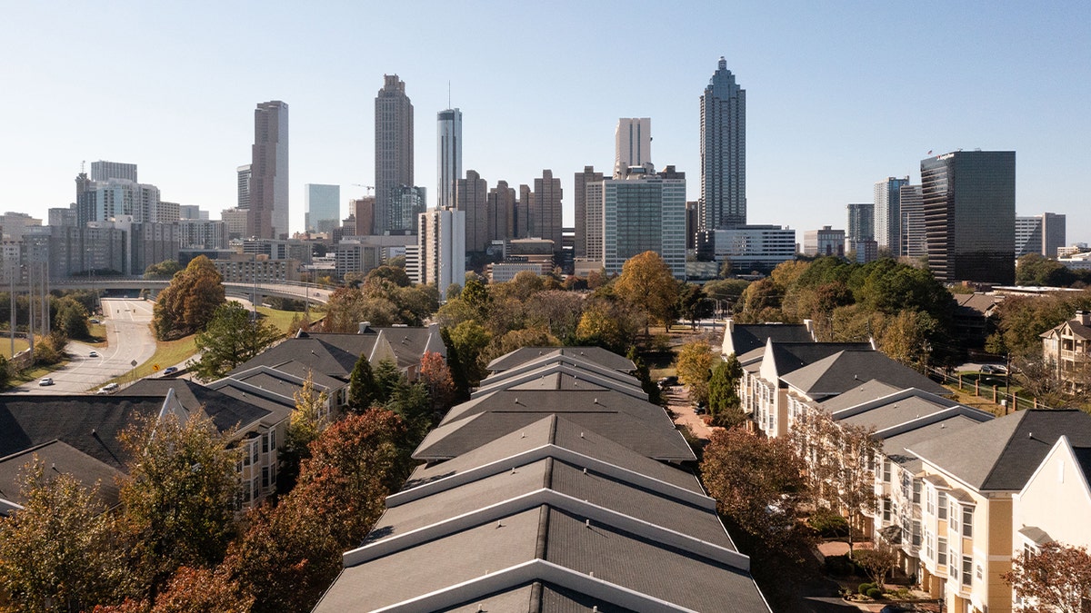 homes in front of atlanta skyline