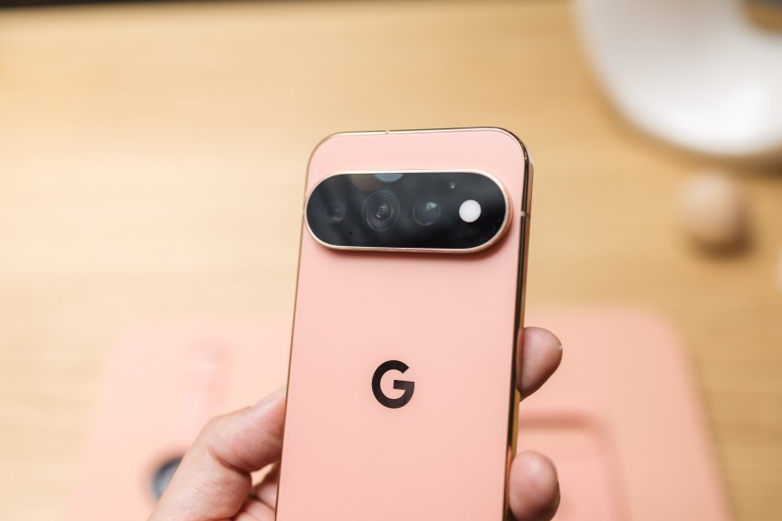 A hand holds a Google phone