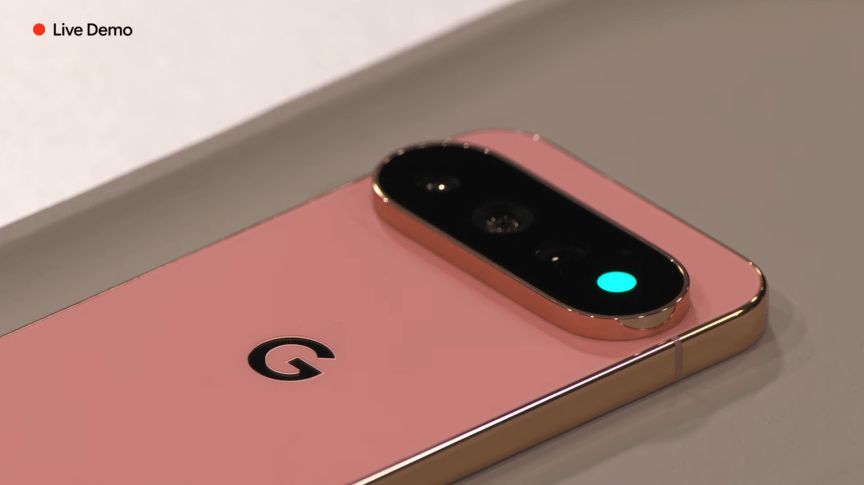 A Pixel 11 Pro smartphone with a green light on the back.