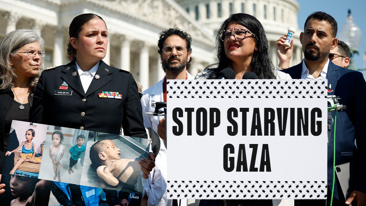 Michigan Rep. Rashida Tlaib stands with a crowd of pro-Palestinian activists outside the U.S. Capitol in Washington, D.C.