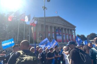 French police take to streets in mass protest over pay, staffing and r