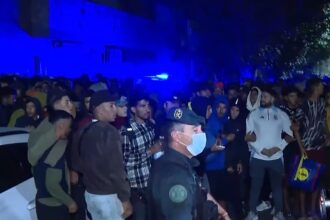Police fire shots in the air as migrants moved to new Ceuta facility
