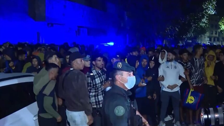 Police fire shots in the air as migrants moved to new Ceuta facility