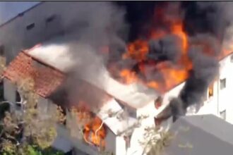 Massive fire engulfs Beverly Hills apartment complex as entire roof caves in