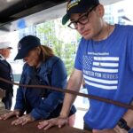First responders honor World Trade Center beam arriving at Boston fallen heroes memorial