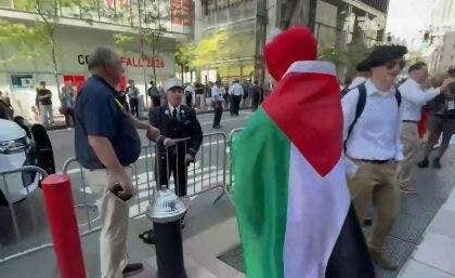 Firefighter caught on camera ripping pro-Palestinian agitator in Elmo costume near Ground Zero on 9/11