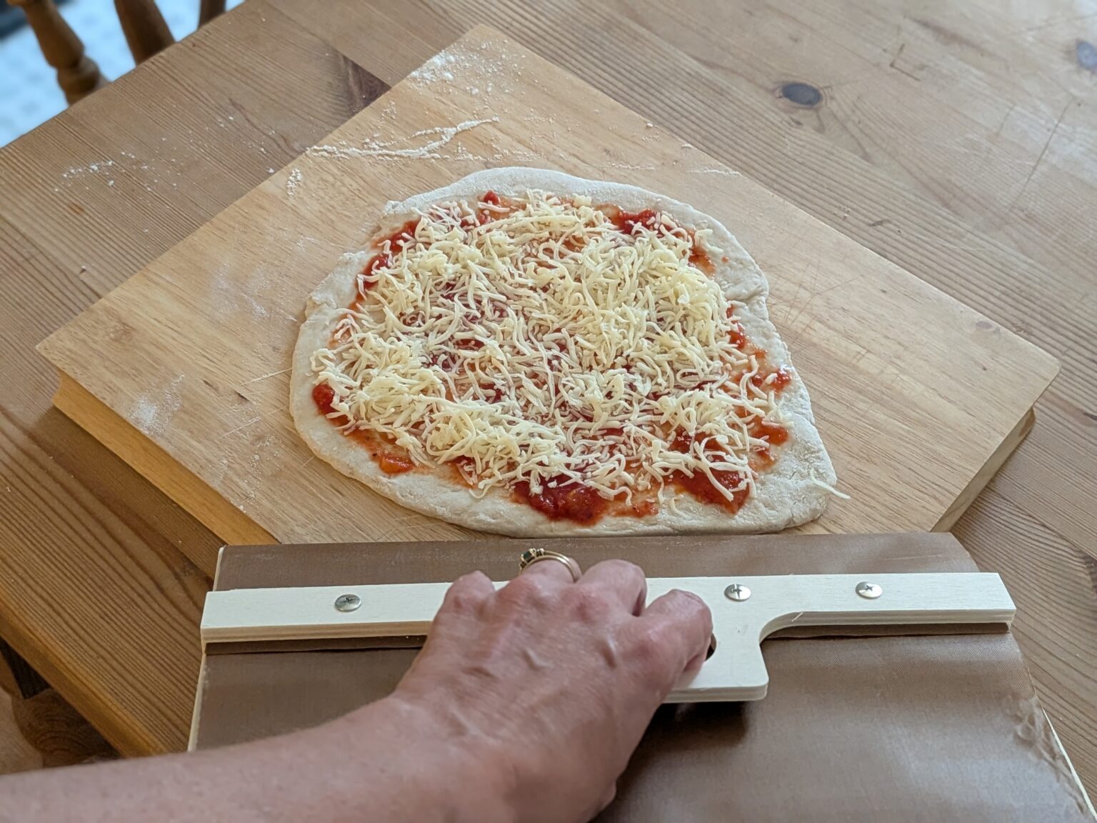 This  Sliding Pizza Peel Promises to Improve Your Launches, but Does It?