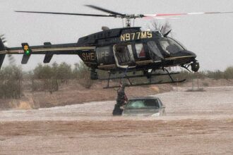 Arizona sheriff deploys helicopter to save 2 stranded in flooded car