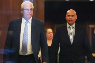 ICE officer accused of lying to FBI about Minneapolis shooting pleads not guilty