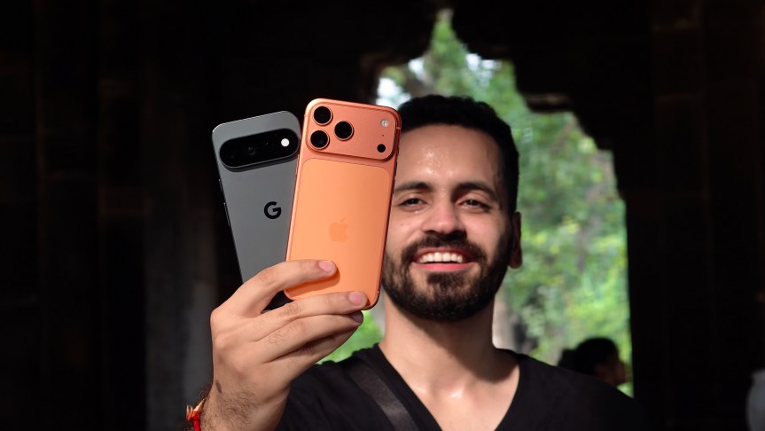 Prakhar Khanna holding Pixel 11 Pro and iPhone 17 Pro
