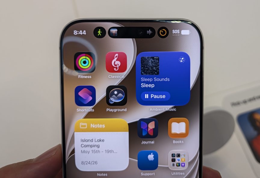 iPhone 18 Pro with three live activities on the display.