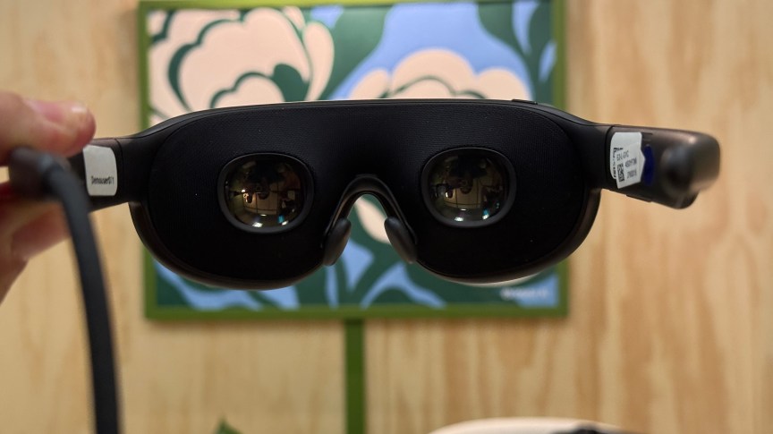 Meta VR Glasses held up with a view of their lenses