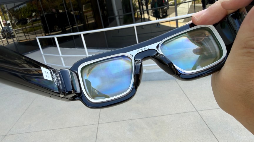 Close up of lenses and lens inserts on a pair of Snap Specs AR glasses
