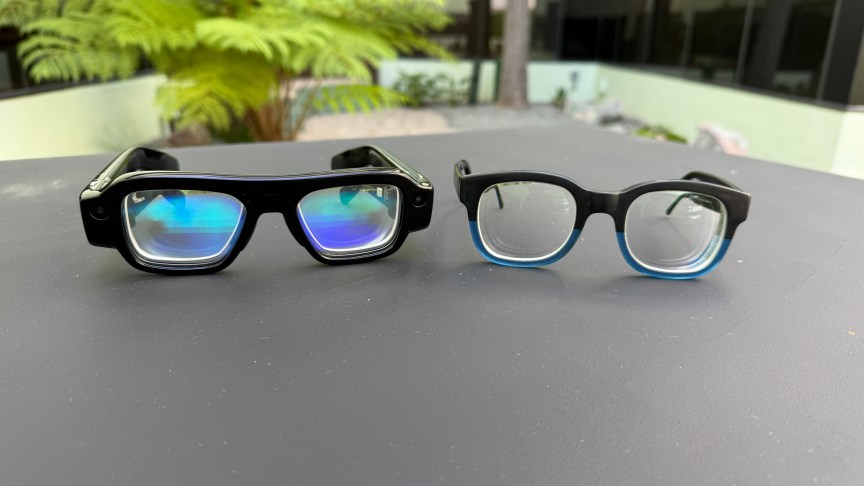 Snap Specs glasses next to regular black and blue glasses on the right.