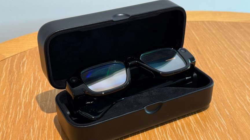 Snap Specs AR glasses inside a large black charging case
