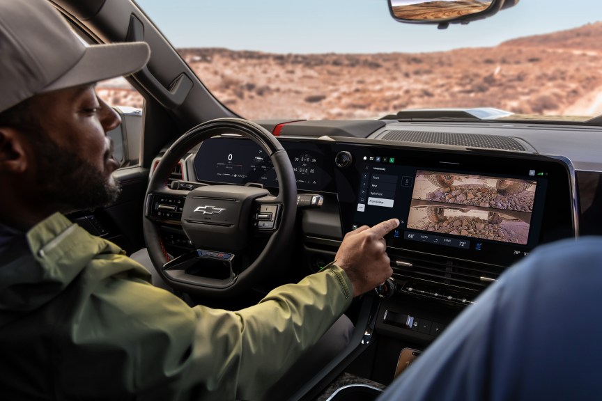 Driver demonstrates Terrain Camera view on the main screen of the Chevrolet Silverado