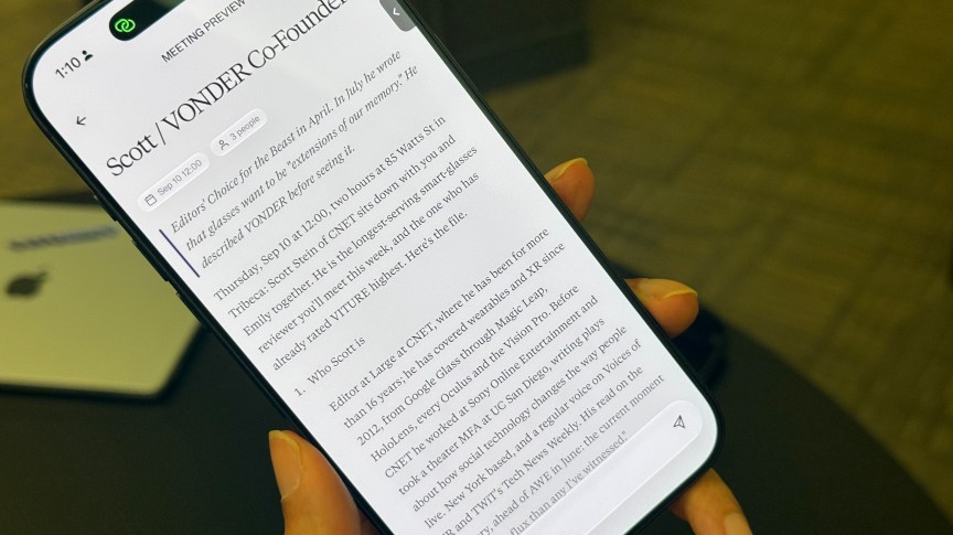 A phone screen showing an AI summary about Scott Stein