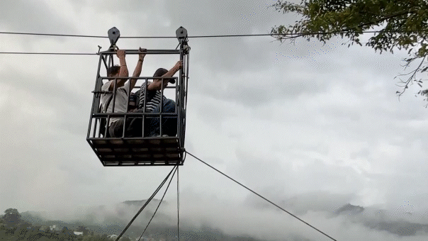 Rescuers use ziplines to transport trapped citizens after devastating Nepal floods decimate country’s bridges