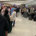 Chaos at major California airport as passengers stuck in miserable lines due to mass outage