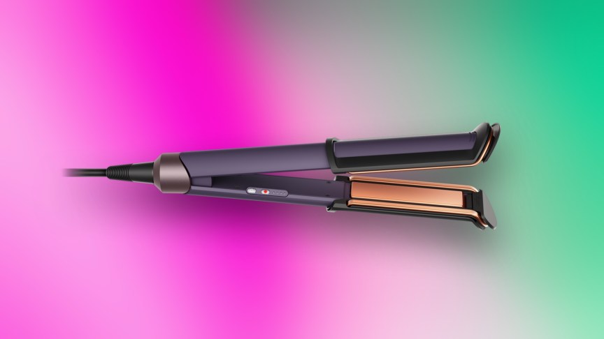 The Dyson Corrale CoolShine over a pink and green gradient background.