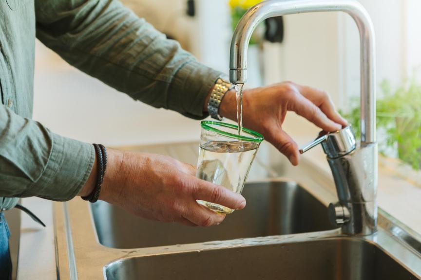 tap water being poured into glass