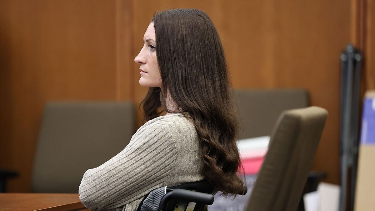 Lindsay Clancy listens to testimony in Plymouth Superior Court.