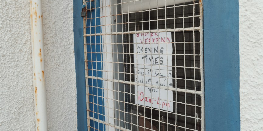 image of a hand-drawn sign in a window